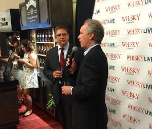 Steve was too busy sipping to get a photo, but Rick captured this image of Mayor Greg Fischer toasting Whisky Live's Dave Sweet